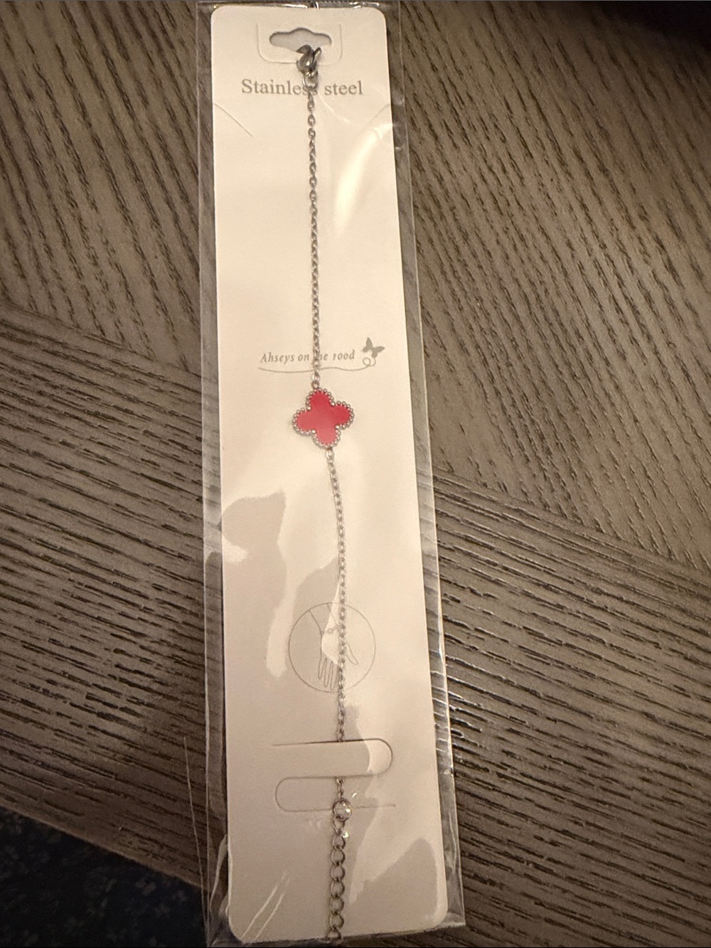 Stainless Steel Bracelet with Red Clover Charm